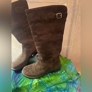 Suede knee high boots . In mint condition